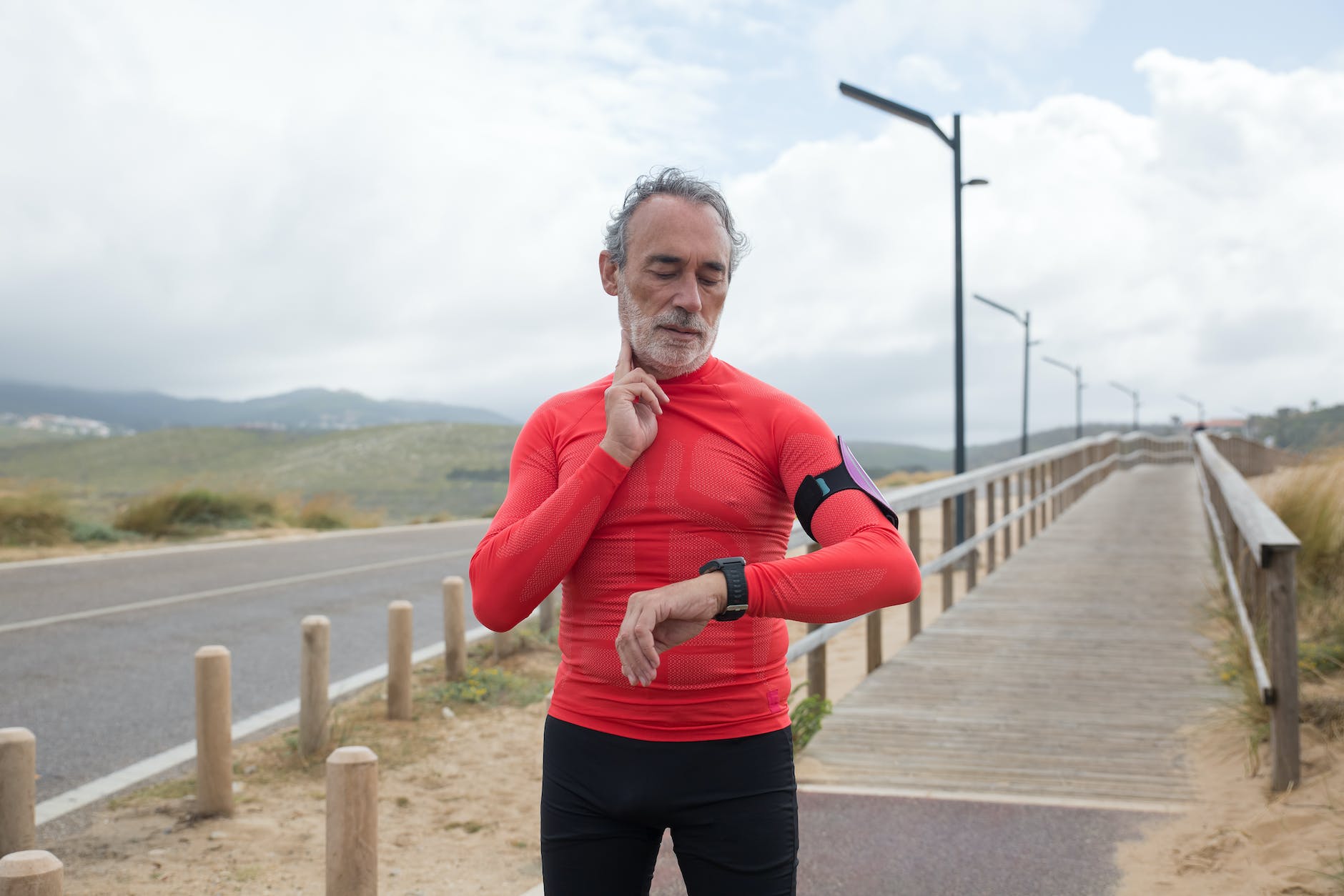 an elderly man jogging